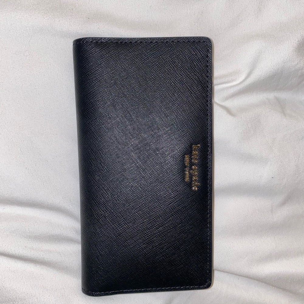 Black kate spade wallet.